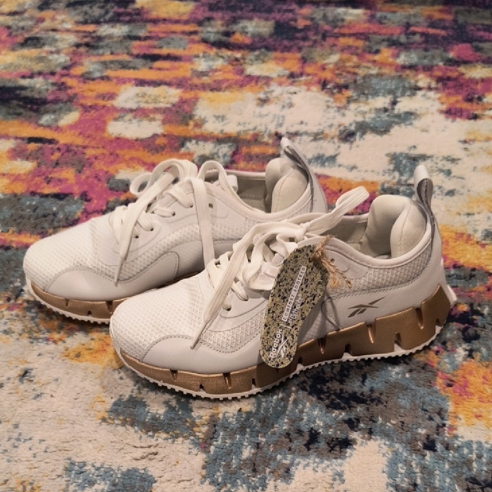 Reebok White and Gold Sleek Sneakers